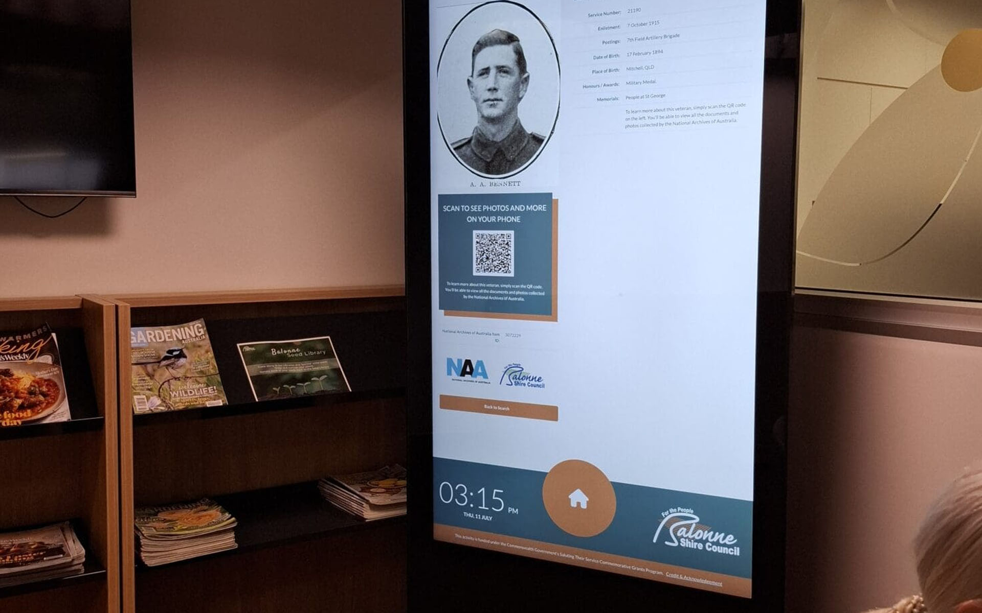 Interactive war memorial touchscreen kiosk at Balonne Shire Council displaying veteran records